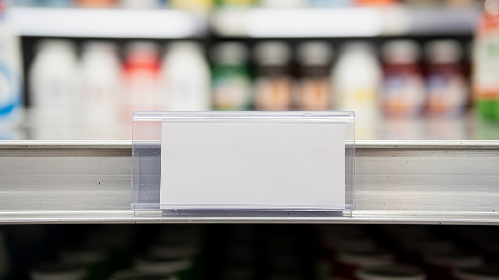 Étiquette de prix en rayon de supermarché